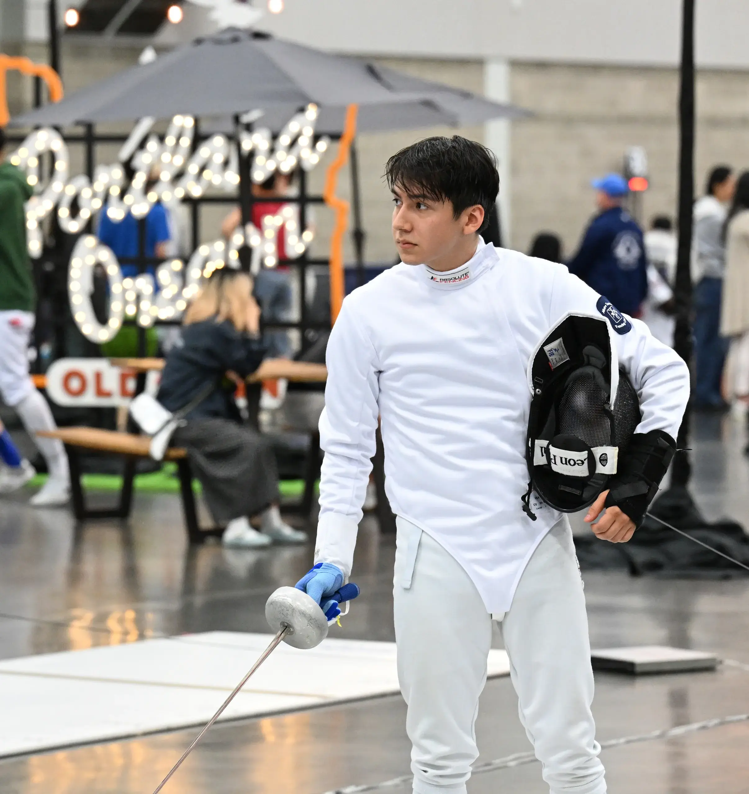Beginner fencers drilling footwork at Metro Tacoma Fencing Club