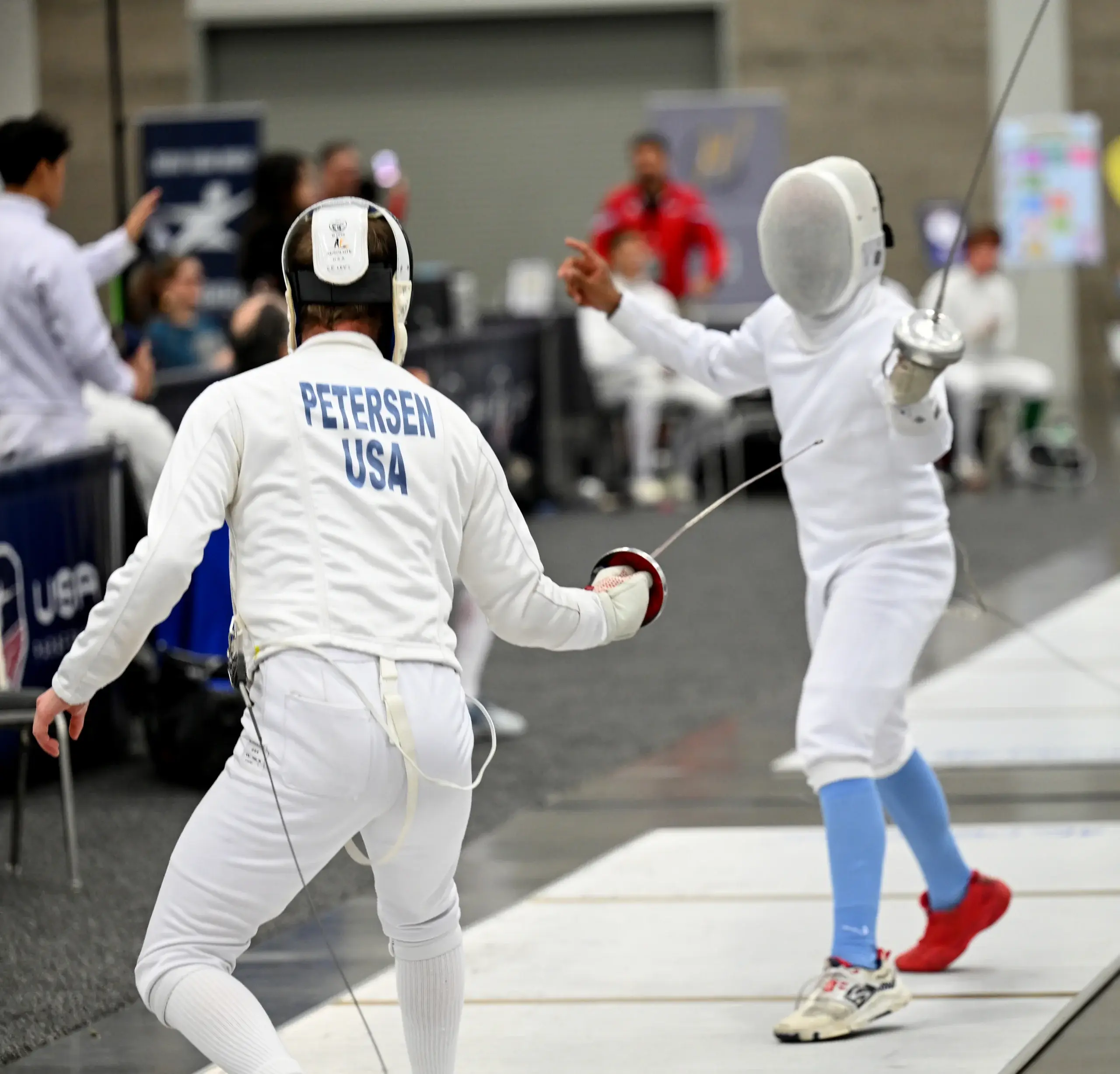 Intermediate fencers sparring at Metro Tacoma Fencing Club